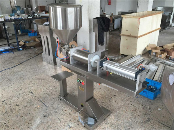 Máy làm đầy mật ong một đầu bán tự động